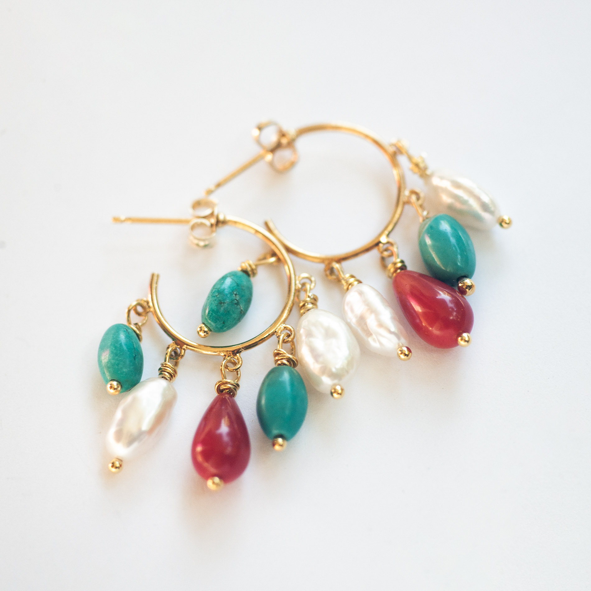Gold plated hoop earrings with fresh water pearls, corals & , turquoise stones.